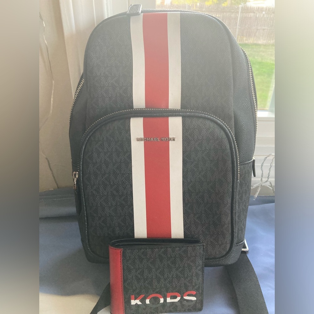 Michael Kors over the shoulder back pack with new never used wallet matching.